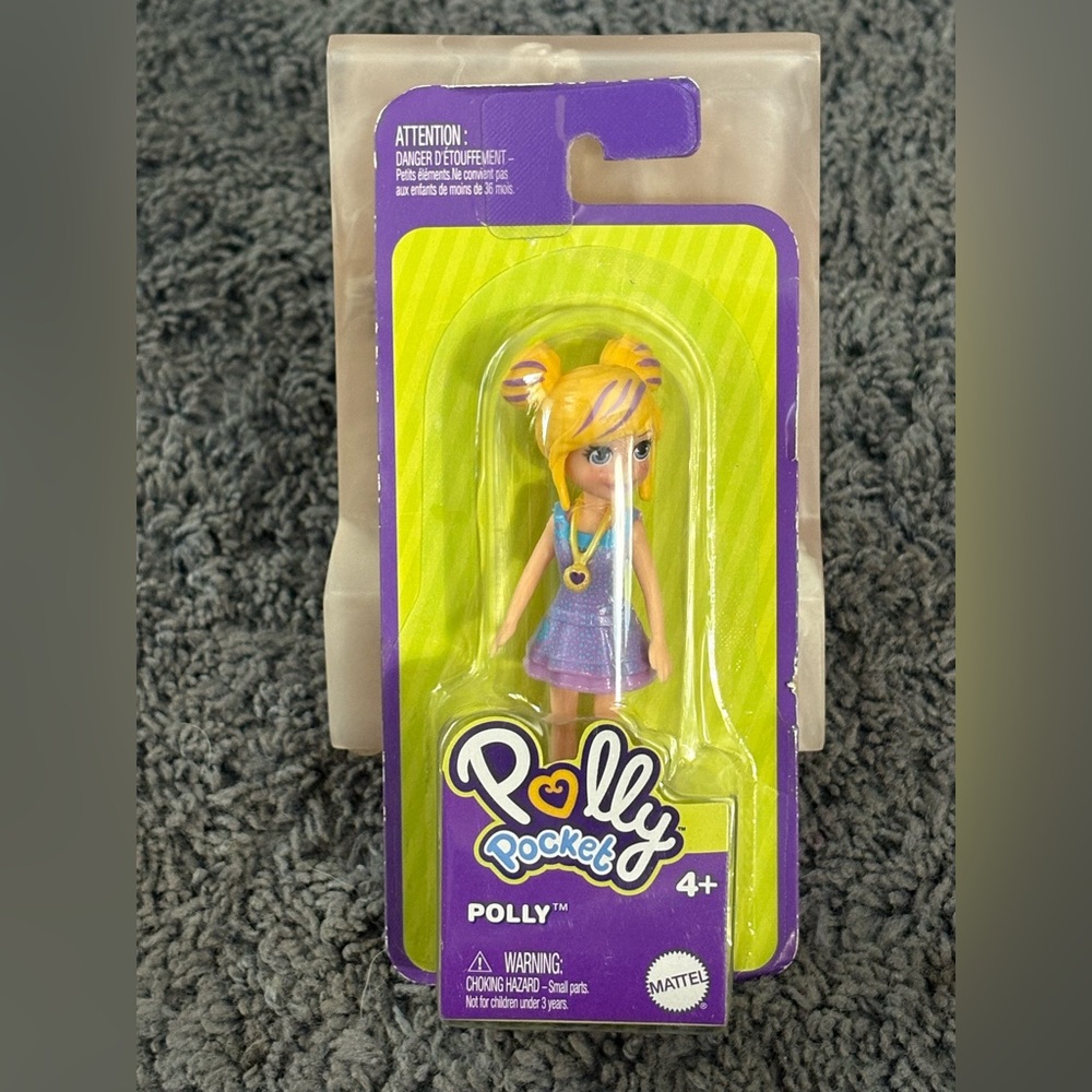 NWT Polly Pocket doll, Polly - purple dress & a necklace and purple hair streaks